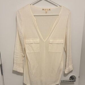 Cream colored V-neck